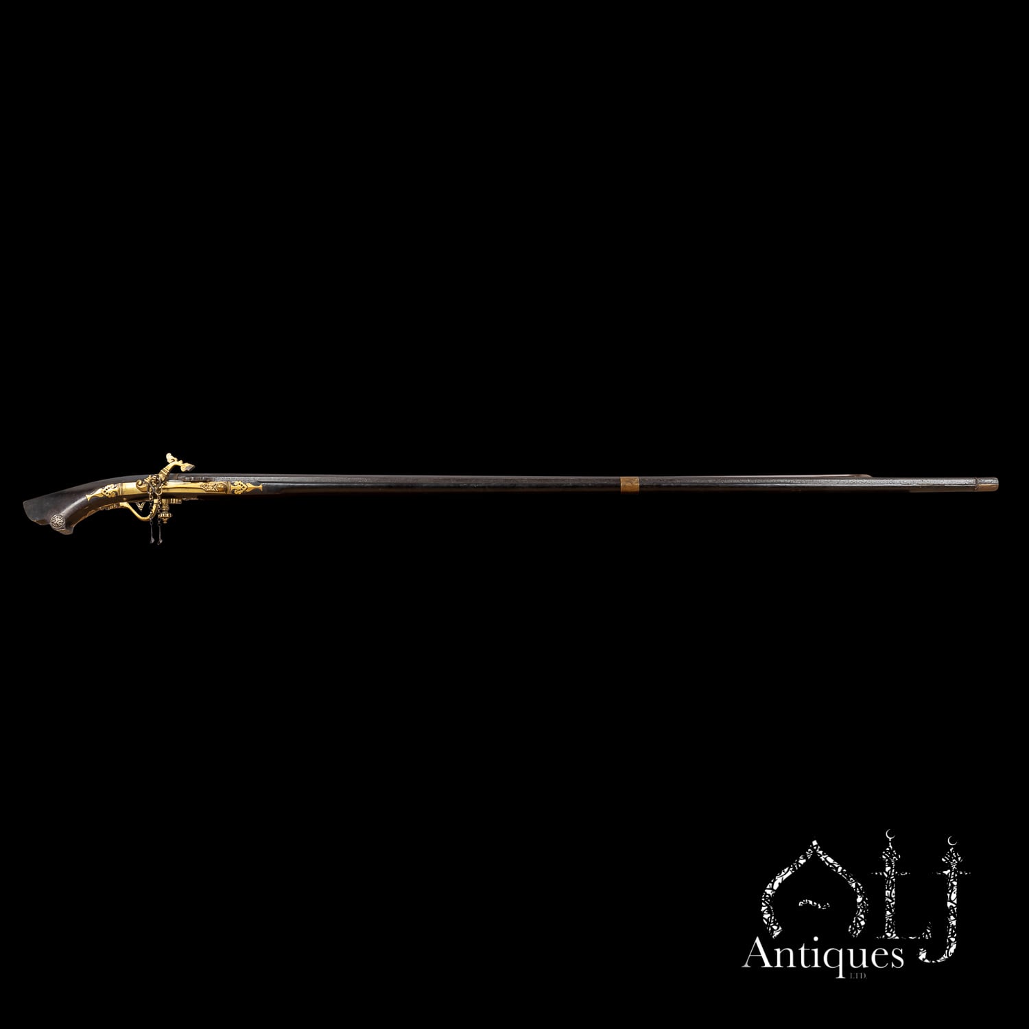 An Exceptionally Rare Monumental Minangkabau Matchlock Rifle (Istinggar / Badil Satengga) West Sumatra, Malay World (Indonesia) Circa 18th Century.