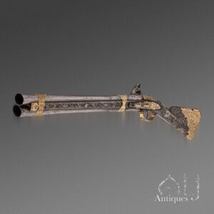 A Magnificent and Possibly Unique Ottoman Double-Barrel Flintlock Blunderbuss with Gold-Damascened Barrels, Silver-Gilt Mounts and Silver-Wire-Inlaid Stock  Ottoman Empire, probably produced across several craft centres including Istanbul and Anatolia (possibly Afyonkarahisar), circa 1800–1820
